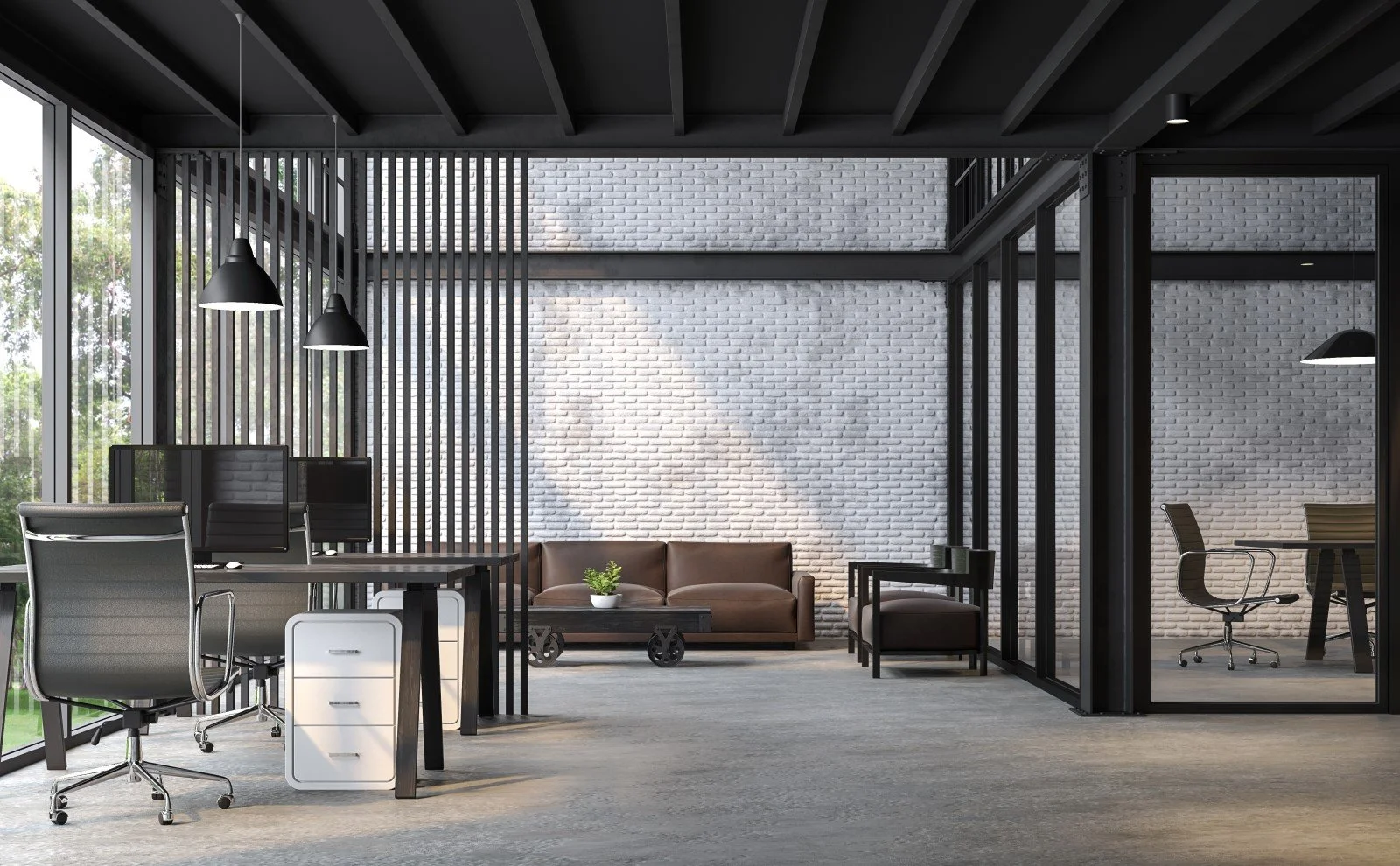 A modern industrial-style office with glass partitions and a seating area